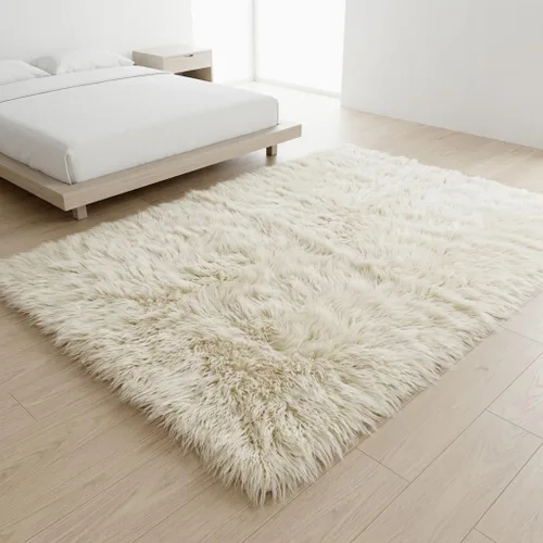 Vista 11 de Elegantes alfombras griegas flokati. Pelo suave y esponjoso de 3 pulgadas. 100% lana natural. Alfombra moderna de color blanco roto lanudo