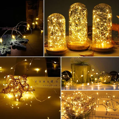 Vista 6 de Paquete de 12 luces LED de hadas AIKEI que funcionan con pilas, cable plateado impermeable de 7 pies, 20 luces LED de luna estrellada de luciérnaga