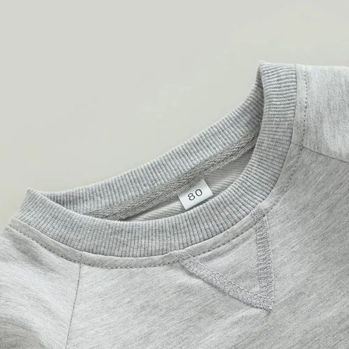 Vista 26 de Sudadera unisex de algodón de color sólido para bebé, camiseta de manga larga con cuello redondo