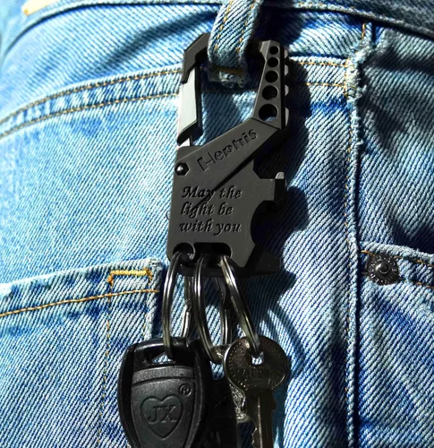 Vista 3 de Llavero resistente con forma de calavera, herramienta de escape de emergencia para automóvil, cortador de cinturón de seguridad, abrebotellas