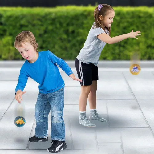 Vista 6 de ArtCreativity Bolas de rebote de dinosaurio de 2 pulgadas, juego de 12, bolas para niños con dinosaurio 3D en el interior, juguetes al aire libre