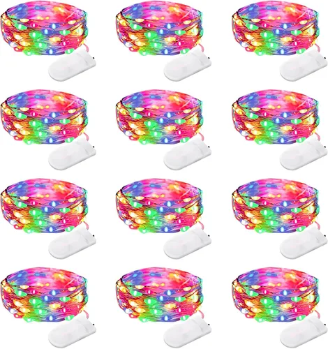 Vista 8 de Paquete de 12 luces de Halloween moradas que funcionan con pilas, luces de cadena de 7 pies, 20 luces LED de hadas, luces mini impermeables, cable
