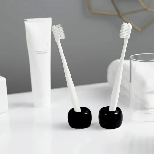 Vista 3 de Mini soporte para cepillos de dientes de cerámica para encimera de tocador de baño, cabezal de cepillo de dientes hecho a mano y soporte para Negro