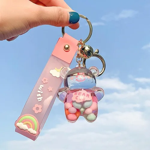 Vista 3 de Llavero Kawaii con diseño de oso líquido flotante de arena movediza, lindo llavero, bolsa, pulsera con dije para mujeres y niñas