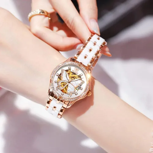 Vista 2 de OLEVS Relojes automáticos de oro rosa para mujer diseño de esqueleto mecánico de cuerda automática elegante vestido de lujo para mujer con diamantes