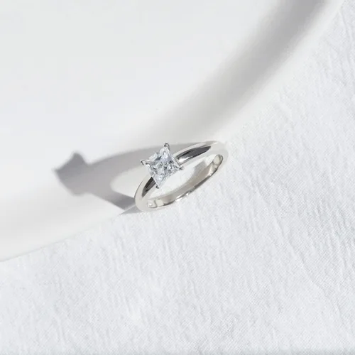 Vista 4 de Tienda Collection Platinum or Gold plated Sterling Silver Princess-Cut Solitaire Ring made with Infinite Elements Cubic Zirconia