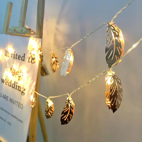 Vista 4 de Guirnalda de luces LED de plumas de oro rosa, farol de hojas de metal, funciona con pilas, luces de hadas para dormitorio, decoraciones de boda