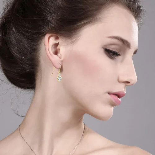 Vista 3 de Gem Stone King Aretes de alambre francés de oro amarillo de 14 quilates, aguamarina azul cielo y circonita blanca para mujer