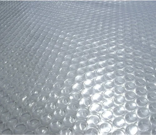 Vista 3 de Manta solar para albercas enterradas, de la marca Blue Wave, rectangular, transparente, hecha de 14-MIL, Transparente