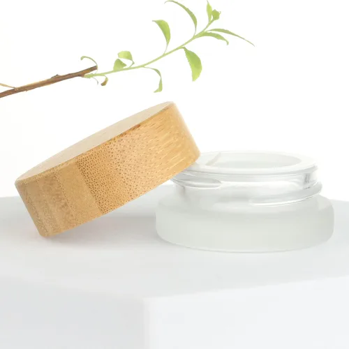 Vista 9 de COSIDEA 18 frascos vacíos de vidrio transparente redondos de 1.7 onzas fluidas con tapas de bambú, tarro de crema de madera, recipientes de viaje