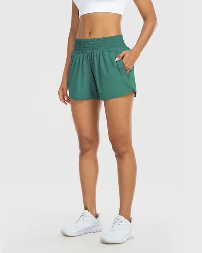 Vista 5 de YEZII Pantalones cortos deportivos para mujer con bolsillos, cintura alta, pantalones cortos de entrenamiento para correr, gimnasio, yoga