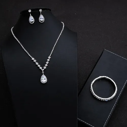 Vista 6 de Paxuan Juego de aretes de pulsera de cristal de diamantes de imitación plateados y dorados para mujeres, novias, damas de honor, juego de aretes