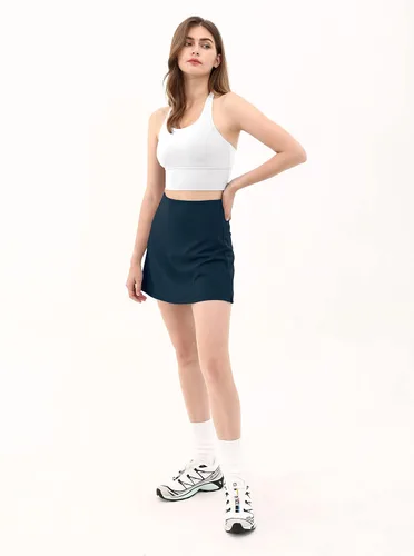 Vista 5 de ODODOS Falda pantalón deportiva de tenis para mujer con bolsillos incorporados, faldas activas de golf para deportes, correr, gimnasio, entrenamiento