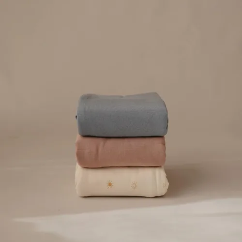 Vista 6 de mushie Manta Envolvente Elástica para Bebé Extra Suave y Ajuste Ceñido 47"x47" (Blush)