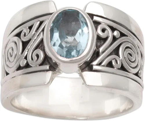 Vista 3 de NOVICA Anillo artesanal hecho a mano con topacio azul de una sola piedra de ley .925 ancho con piedra natal de serenidad de Indonesia 'Blue Karma