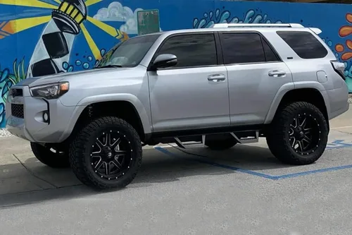 Vista 3 de Raptor Series Estribos laterales compatibles con 4Runner 2010-2024 sin borde de puerta inferior, tableros negros texturizados para camiones