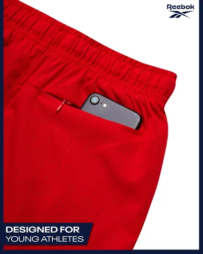 Vista 5 de Reebok Pantalones cortos de baloncesto 2 en 1 con forro de compresión y bolsillos, pantalones cortos deportivos para niños para gimnasio y correr