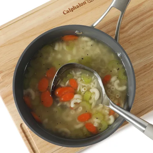 Vista 7 de Calphalon Edge - Cucharón de sopa de acero inoxidable, cucharón para servir con mango de silicona, resistente al calor, antiadherente, seguro