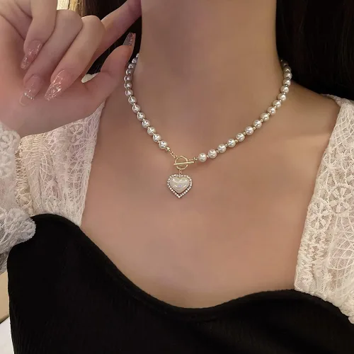 Vista 6 de GELMOINY Collares de perlas para mujer, collar de perlas de imitación de 0.23 pulgadas, collar de perlas de corazón chapado en oro de 14 quilates