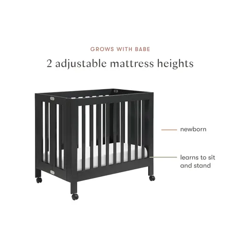 Vista 7 de Babyletto Origami Mini cuna plegable portátil con ruedas en negro, 2 posiciones de colchón ajustables, certificado Greenguard Gold