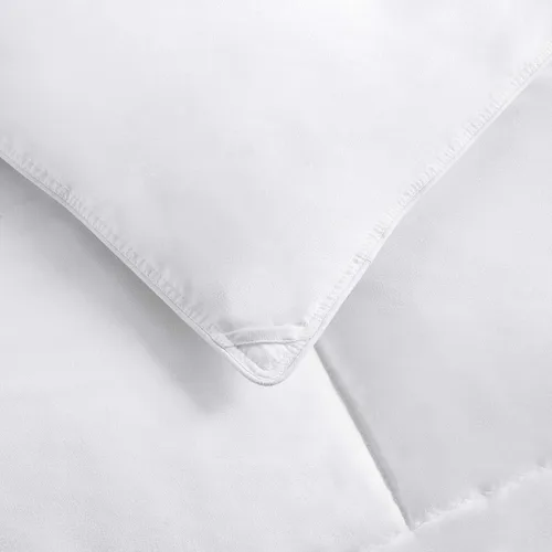Vista 3 de Amazon Basics Edredón alternativo de plumón blanco e relleno de edredón con pestañas en las esquinas, lavable a máquina, tamaño individual