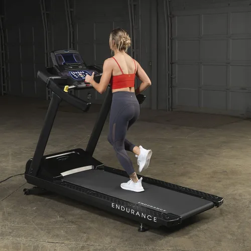Vista 3 de Endurance by Body-Solid (T150) Cinta de correr inclinada para correr y caminar, capacidad de peso de 400 libras, máquina de correr con motor