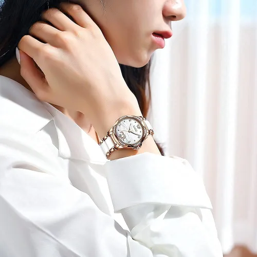 Vista 7 de OLEVS Relojes de oro rosa para mujer, relojes automáticos con pulsera de cerámica de acero inoxidable de dos tonos, relojes de cuerda automática