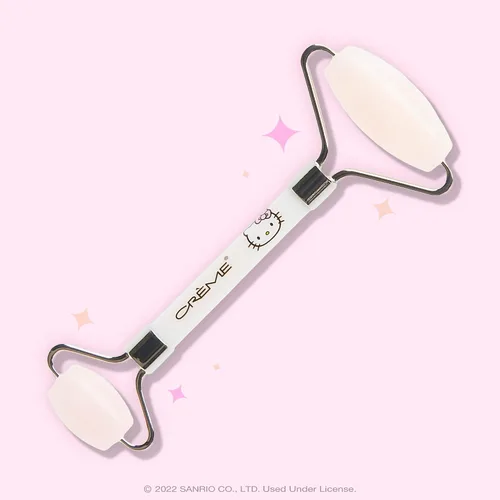 Vista 2 de The Crème Shop Rodillo de masaje facial de cuarzo Hello Kitty Love
