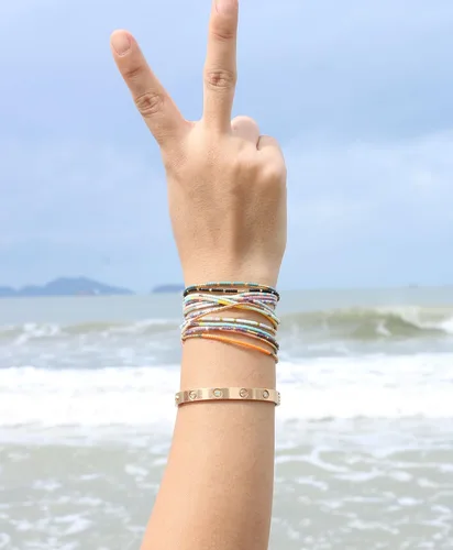 Vista 2 de KELITCH 10 pulseras elásticas de la amistad con borlas