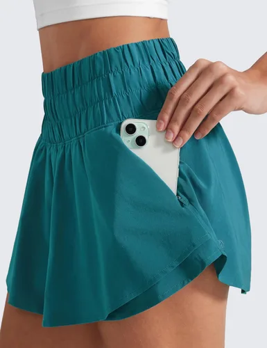 Vista 4 de CRZ YOGA - Pantalones cortos deportivos para mujer, cintura alta, holgados, con volantes, para entrenar, correr, tenis y bolsillo con cremallera