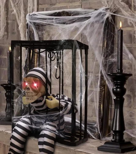 Vista 6 de Decoraciones animadas de Halloween con sensor infrarrojo, prisionero de calavera Screaming Sound Effects; Glowing Red Eye; Infrared-activated
