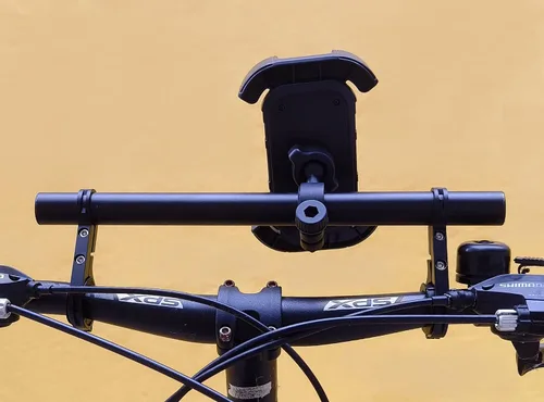 Vista 2 de Extensor de manillar de bicicleta con soporte para teléfono, barra de extensión de aluminio de 11.9", se ajusta a barras de 18–34mm, soporte