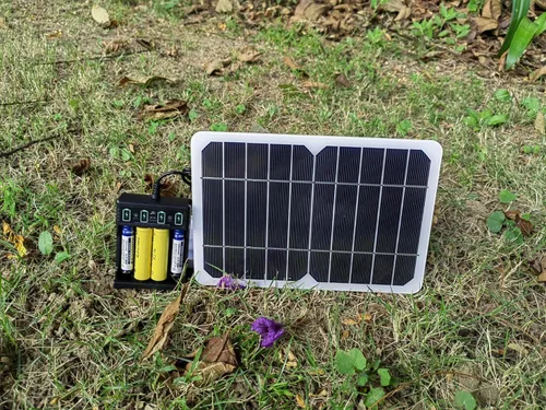 Vista 2 de HUI YINGC Cargador de energía solar con panel solar portátil de 5 vatios para baterías recargables de 1.2 V AA y AAA para el hogar, con panel solar