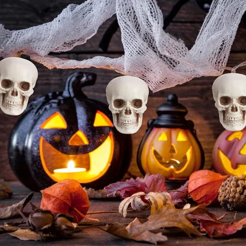Vista 5 de Boao 10 piezas de cabeza de esqueleto de Halloween pequeños mini calaveras para decoración de fiesta de Halloween, decoración de mesa