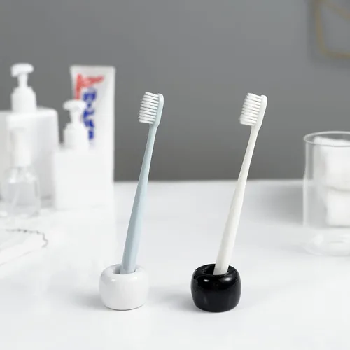 Vista 4 de Mini soporte de cerámica para cepillos de dientes para parejas, soporte para cepillos de dientes de baño hecho a mano, soporte para cabezal