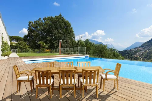 Vista 3 de Mesa rectangular de teca Elzas para patio al aire libre, hecha de madera maciza de teca de grado A