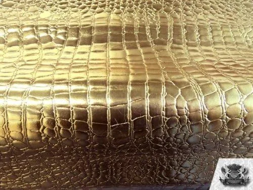 Vista 4 de Tela de tapicería de cuero falso de oro de cocodrilo de vinilo por la yarda