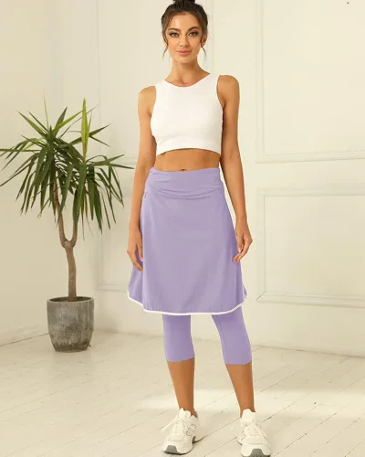 Vista 4 de Aurgelmir Faldas de golf hasta la rodilla para mujer con pantalones capri para entrenamiento, yoga, faldas atléticas