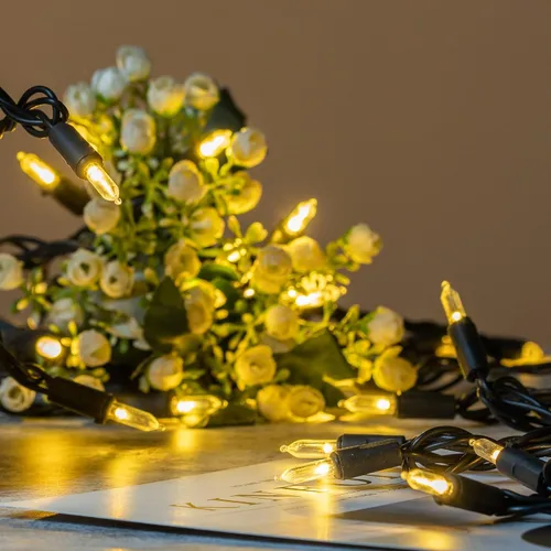 Vista 4 de YULETIME Juego de 200 luces LED de Navidad de color blanco cálido con cable negro, paquete de 2 hebras de 33 pies, 100 luces con certificación UL