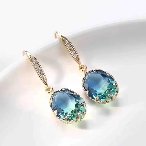 Vista 5 de Aretes colgantes de piedra preciosa de turmalina azul simple, aretes colgantes clásicos de oro brillante con circonita de cristal ovalado, joyería