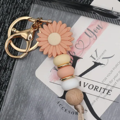 Vista 6 de MyfavoriteK Llavero de silicona con cuentas de flores para mujer, bonito llavero para llaves de coche, bolso, mochila, adorno