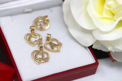 Vista 3 de Colgante de corazón de dos tonos de 14 quilates en oro amarillo y rosa