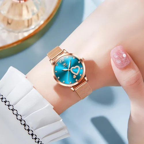 Vista 3 de OLEVS - Reloj de oro rosa para mujer con correa de malla, estilo de moda, diseño de corazones, de cuarzo japonés, resistente al agua, luminiscente