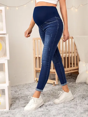 Vista 4 de Floerns Pantalones de mezclilla de maternidad de cintura alta con dobladillo rasgado, con bolsillo para mujer