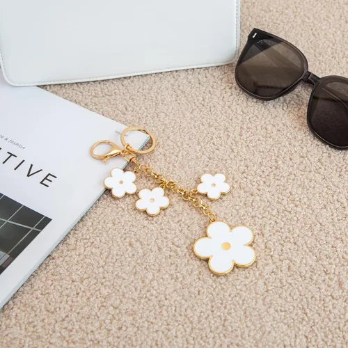 Vista 8 de Accesorios esmaltados para bolso de flores para mujer
