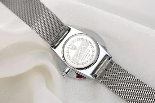 Vista 4 de MASTOP Reloj de pulsera con correa de malla tejida de acero inoxidable plateado para mujer, diseño simple analógico, reloj de cuarzo