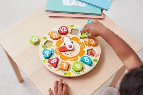 Vista 2 de Hape Juego de rompecabezas de reloj grueso, multicolor, 9.65 x 1.38 pulgadas