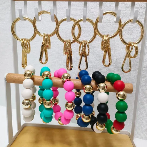 Vista 3 de Junyuerly Llavero de pulsera con cuentas de silicona para mujer, pulsera elástica con clip dorado