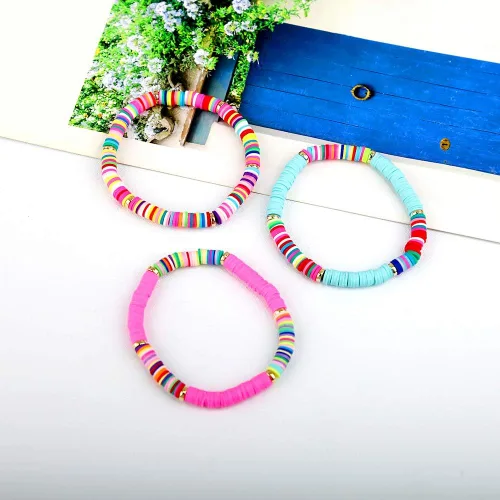 Vista 5 de CASDAN 14 pulseras Heishi para mujer con cuentas de disco de vinilo arco iris Srting Stack pulsera surfista cuerda elástica pulseras verano playa