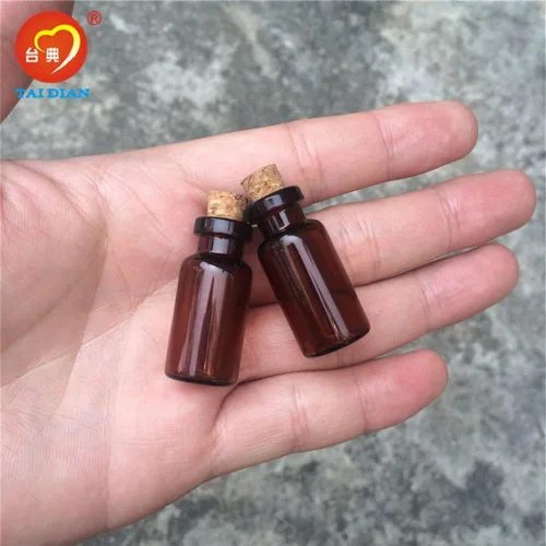 Vista 5 de Frascos de vidrio ámbar de 0.1 fl oz con corcho vacíos pequeños tarros de vidrio marrón